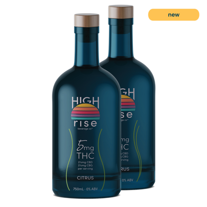 Two High Rise Citrus THC infusion bottles, with 5mg THC in the front and 10mg in the back. Bottles are dark blue bottle, 750ml with High Rise logo. Per serving includes 2.5mg CBD and 2.45mg CBG.